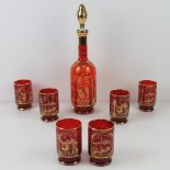 A Venetian ruby glass decanter set having six glasses, all having gilded scene and decoration upon,