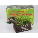 A contemporary 'Karma Chameleon' animated singing telephone in original box.