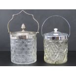 Two cut glass wafer / biscuit barrels, one with nickel plated lid and handle and one chromed.