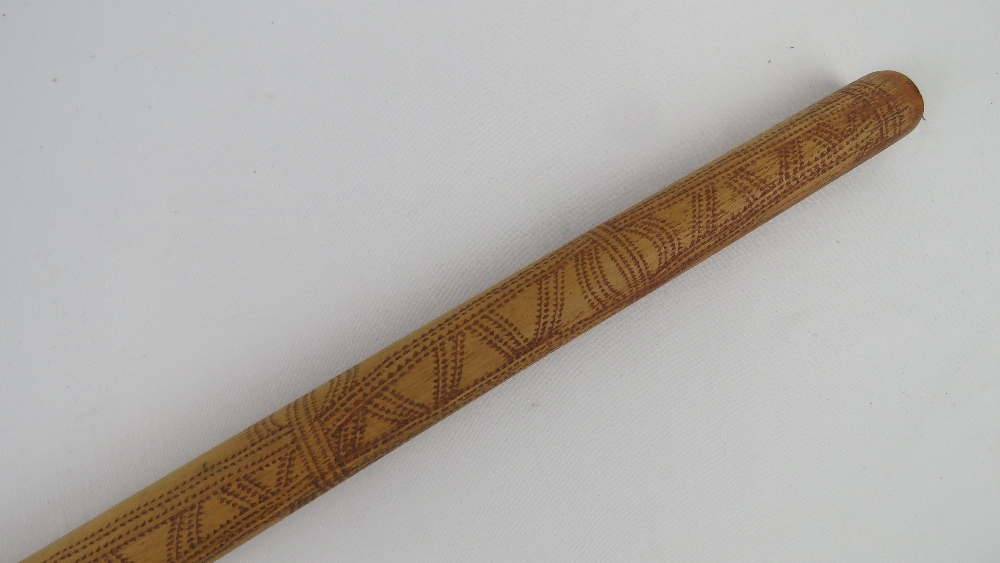 A decorative dagger in carved wood and brass sheath, - Image 4 of 6