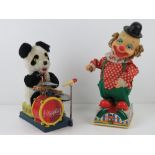 A c1970s 'Mambo' electric bear drummer, being a panda with a drum kit. 26cm high.