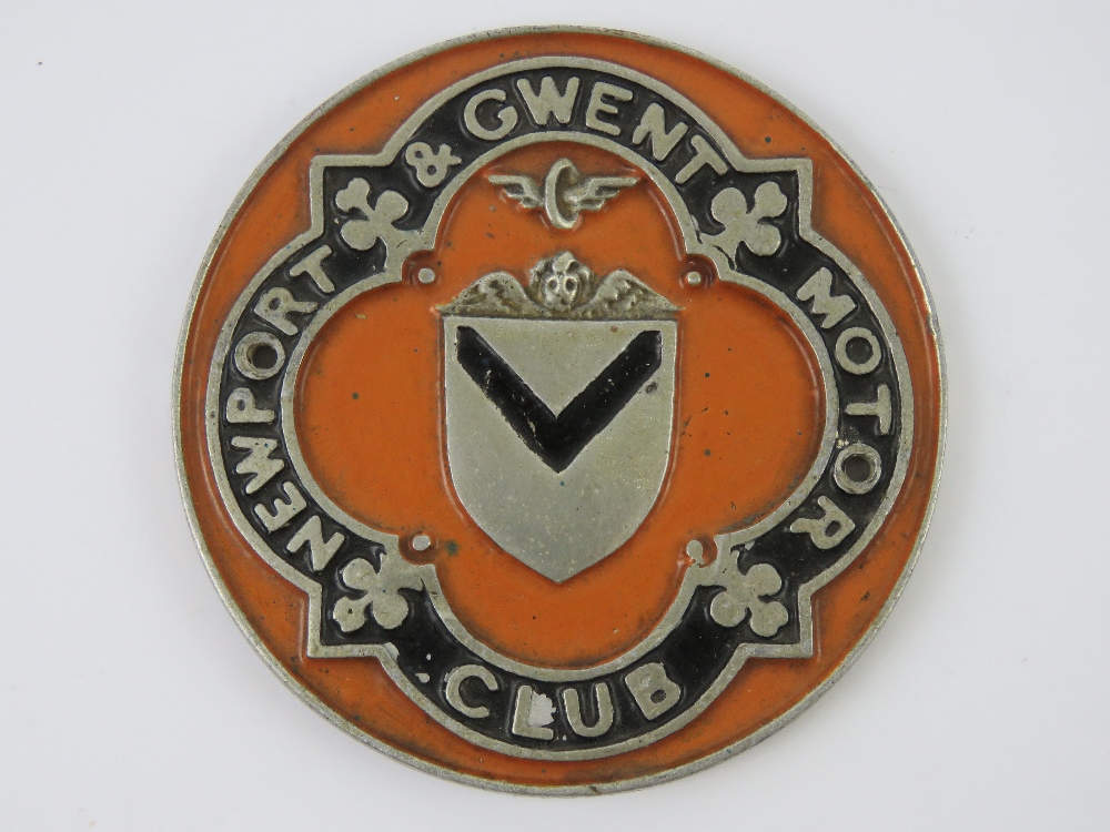 A rare vintage Newport & Gwent Motor Club car badge, painted in Newport County orange, 9.8cm dia.