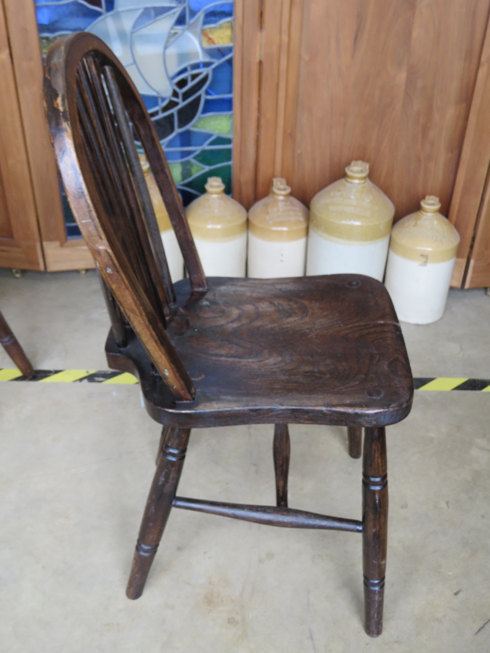 A pair of hoop back spindle turned elm seated chairs. - Image 3 of 4