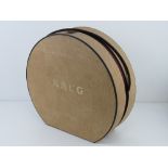 A Krug champagne gift box in the style of a hat box, contents deficient, to fit three bottles,