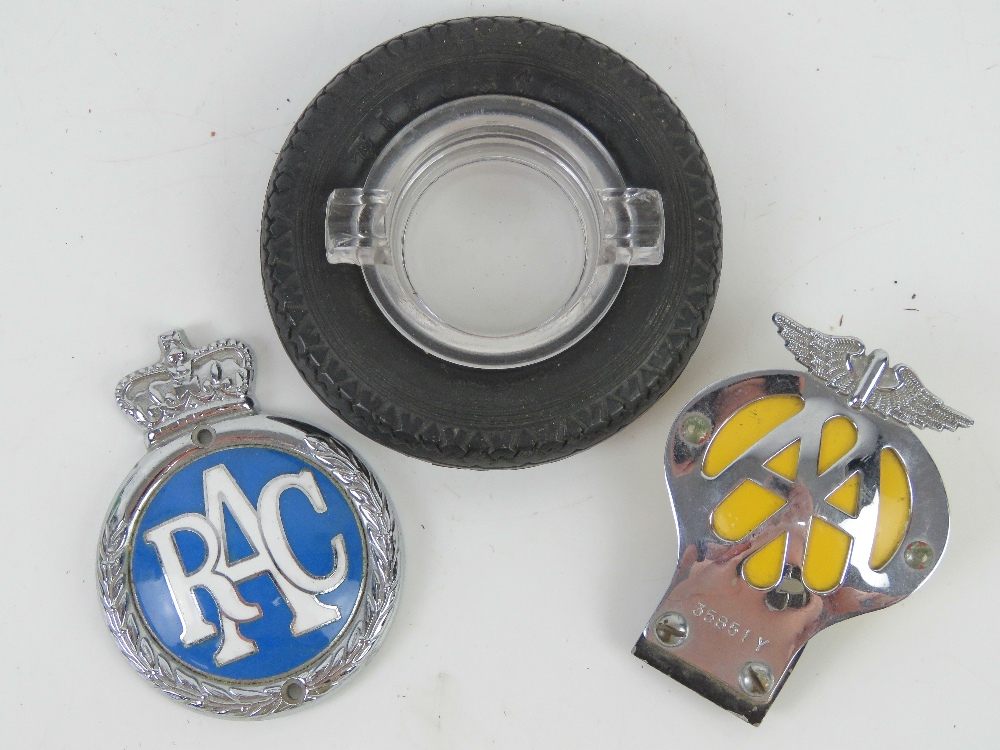 An AA car badge number 35851Y together with an RAC car badge and a 'Firestone Tyre' smoker's