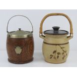 A wooden wafer / biscuit barrel together with a ceramic wafer barrel with bamboo handle. Two items.