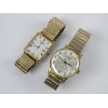 Two vintage wristwatches being Rotary with white dial and date aperture,