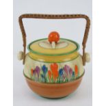 A Clarice Cliff Bizarre pattern waffer / biscuit barrel, in the Crocus pattern, wicker handle,