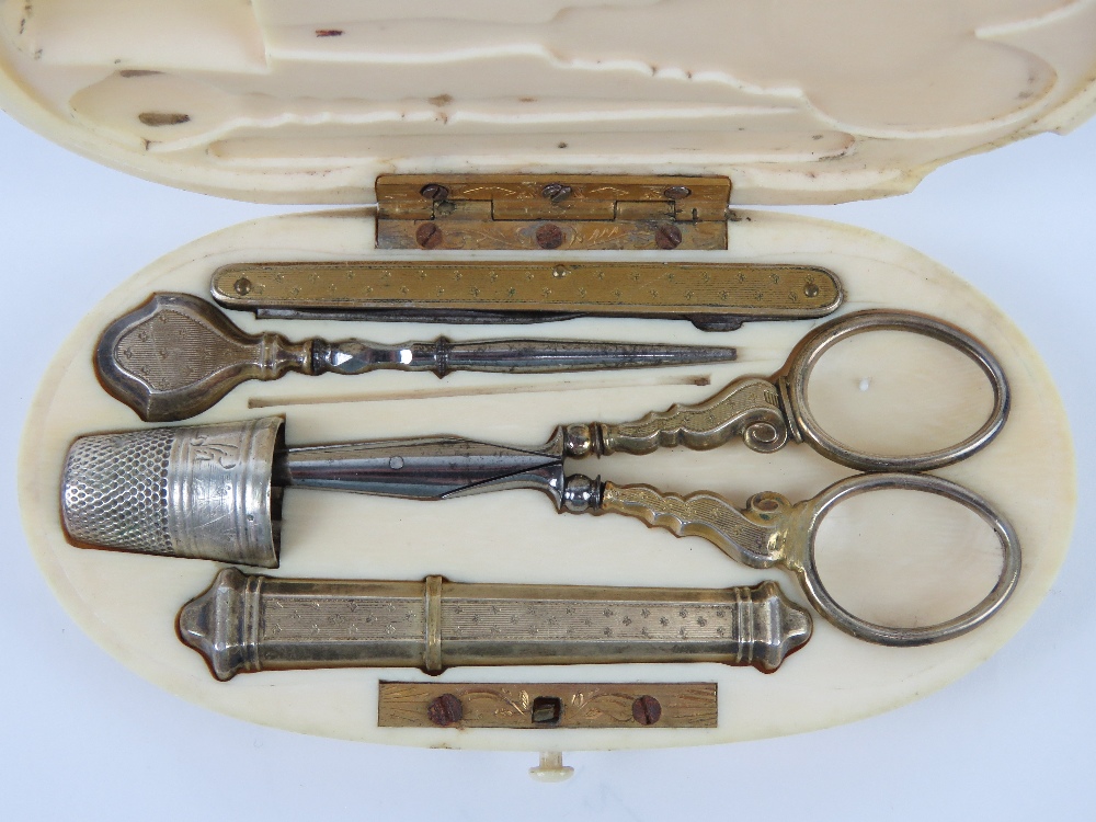 A 19th century French ivory etui sewing set, gilt metal, no apparent hallmarks, comprising scissors, - Image 3 of 4