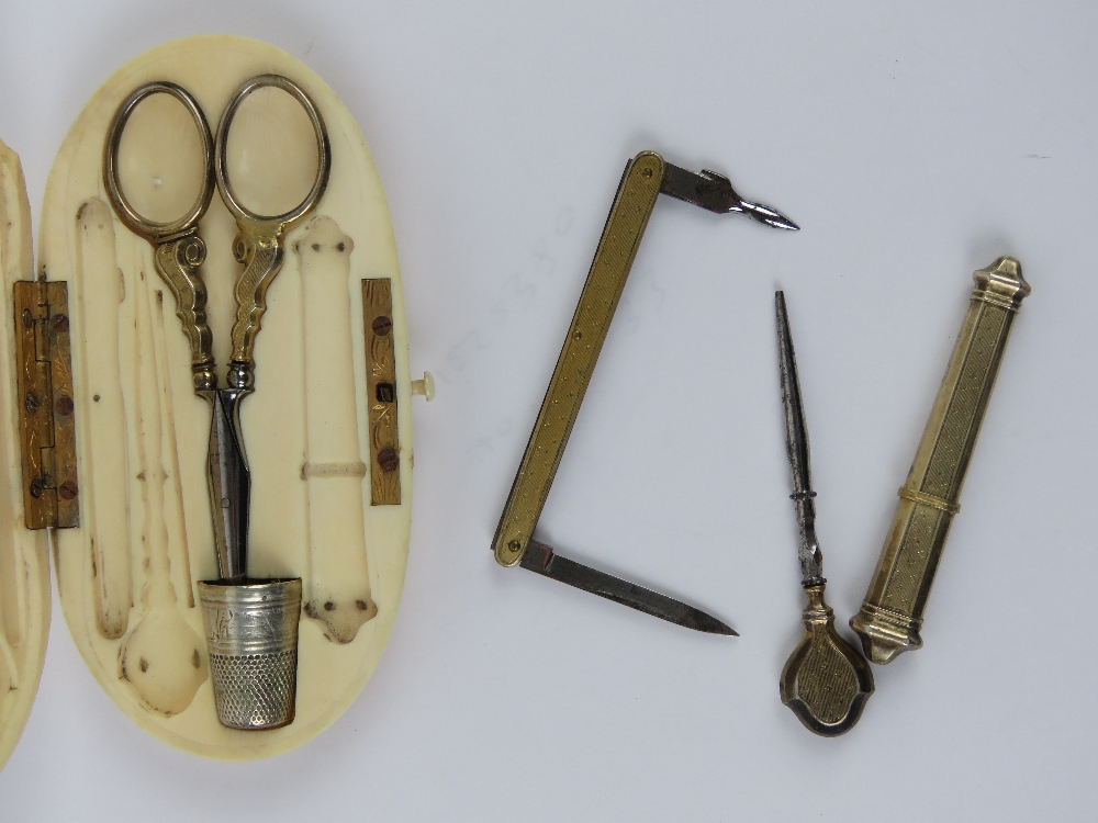 A 19th century French ivory etui sewing set, gilt metal, no apparent hallmarks, comprising scissors, - Image 2 of 4