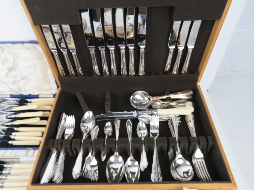 A large quantity of assorted silver plated and other cutlery including part set in wooden canteen, - Image 3 of 7