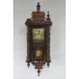 An early 20thC Vienna wall clock having