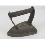 A No3 cast metal iron having ace of club