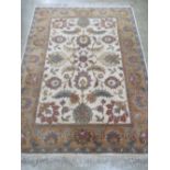 A good heavy woollen and silk floral rug