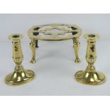 A good brass footman raised over four le