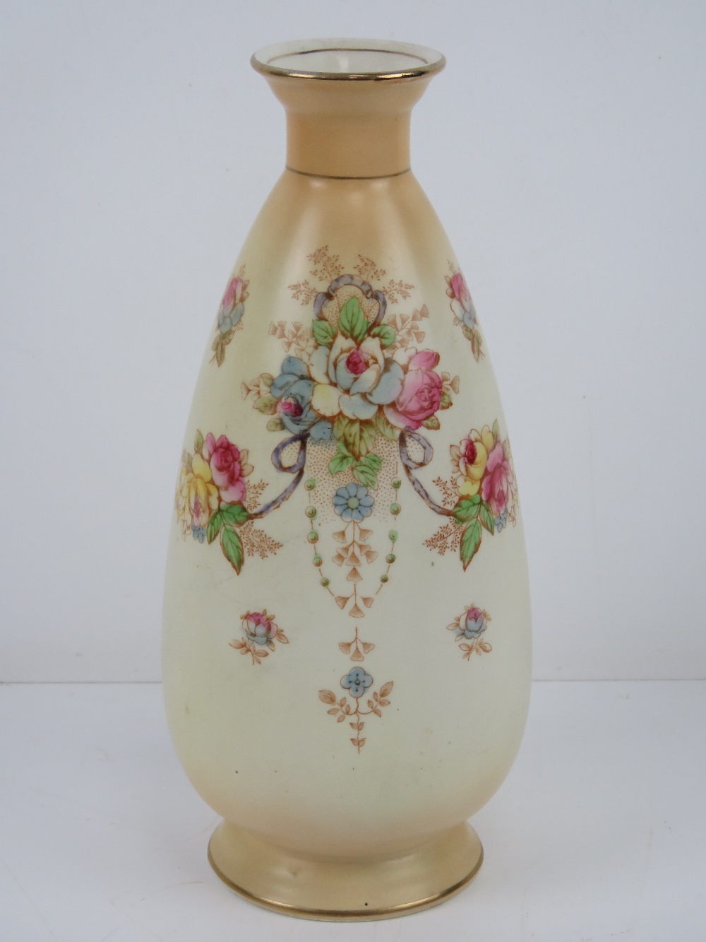 A Crown Devon blush vase having floral d