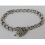 A HM silver curb link chain charm bracel