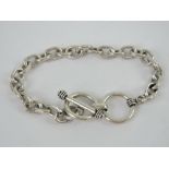 A HM silver charm bracelet having double