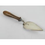 A silver plated masonic trowel having tu