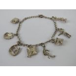 A sterling silver charm bracelet having