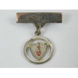 A HM silver Sacred Heart enamelled brooc