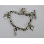 A HM silver charm bracelet having T-bar