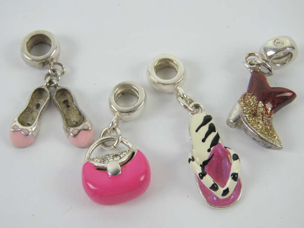 A set of four silver and enamel Pandora