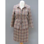 Designed and made by Rosemarie van Bree; Two piece jacket and skirt suit in tweed,