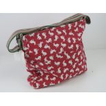 An 'as new' fabric tote bag having rabbit pattern upon 34 x 35cm.