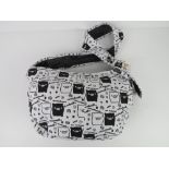 A cross body fabric bag having pig themed pattern 'as new', approx 40 x 24cm.