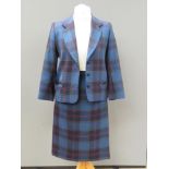 Designed and made by Rosemarie van Bree; Two piece jacket and skirt suit in blue tartan,