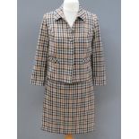 Designed and made by Rosemarie van Bree; Two piece jacket and skirt suit in tweed,