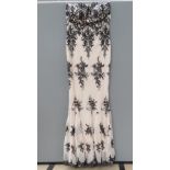 A floor length blush evening dress by Quiz with black sequins, 'as new' with tags, size 10.