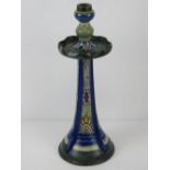 A ceramic table lamp base in blue and gr