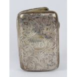 A HM silver cigarette case having scroll