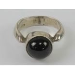 An onyx ring, size M-N, stamped 925.