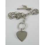 A HM silver charm bracelet having T-bar