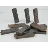 Ten WWII Tokarev pistol magazines.