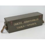 A box containing a British Enfield rifle armourer's kit and breach cover, inc; sling,