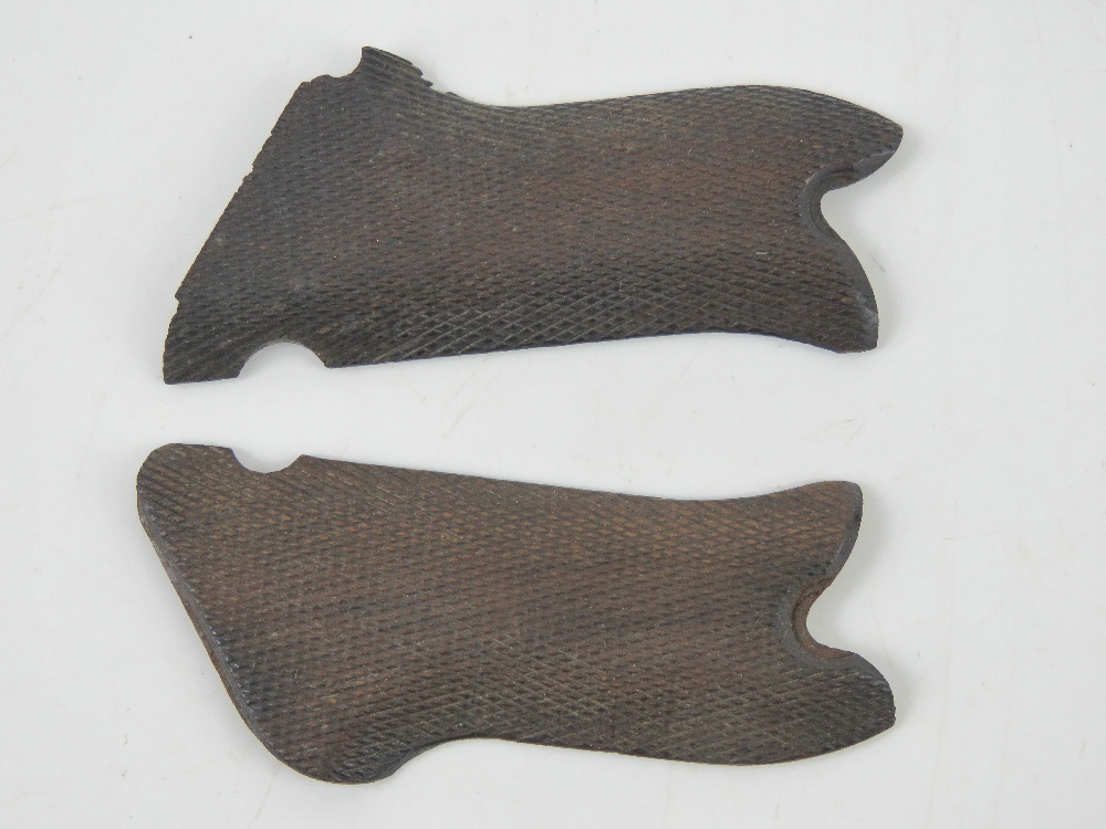 A pair of WWI Luger pistol wooden grips.