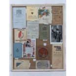 A framed montage of WWII items inc Motorfuel ration book,