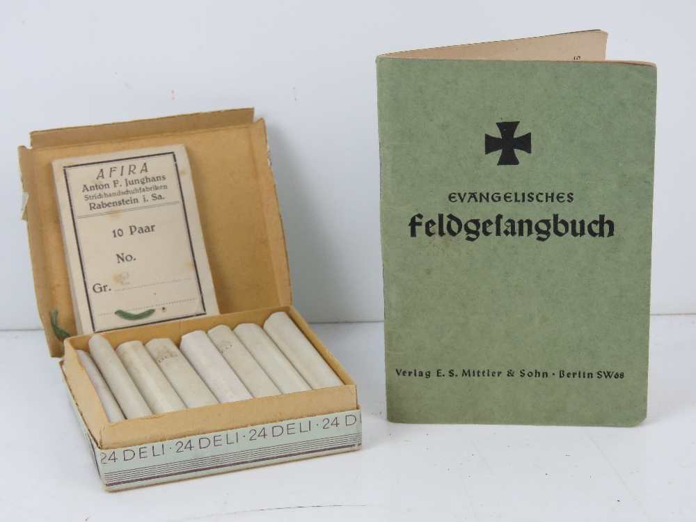 A WWII German Deli cigarettes in box, together with hymn book.