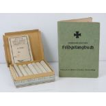 A WWII German Deli cigarettes in box, together with hymn book.