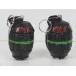 Two inert reproduction Mills grenades with pins.