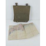 A canvas navigator's pouch having map of English coastline and Channel, dated 1944.