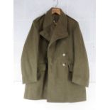 A post war British REME Great Coat, labeled and dated 1956.