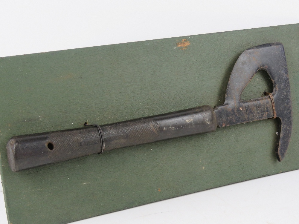 A WWII RAF Lancaster Bomber escape hatchet, having broad arrow upon, marked Elwell and dated 1944. - Image 4 of 4