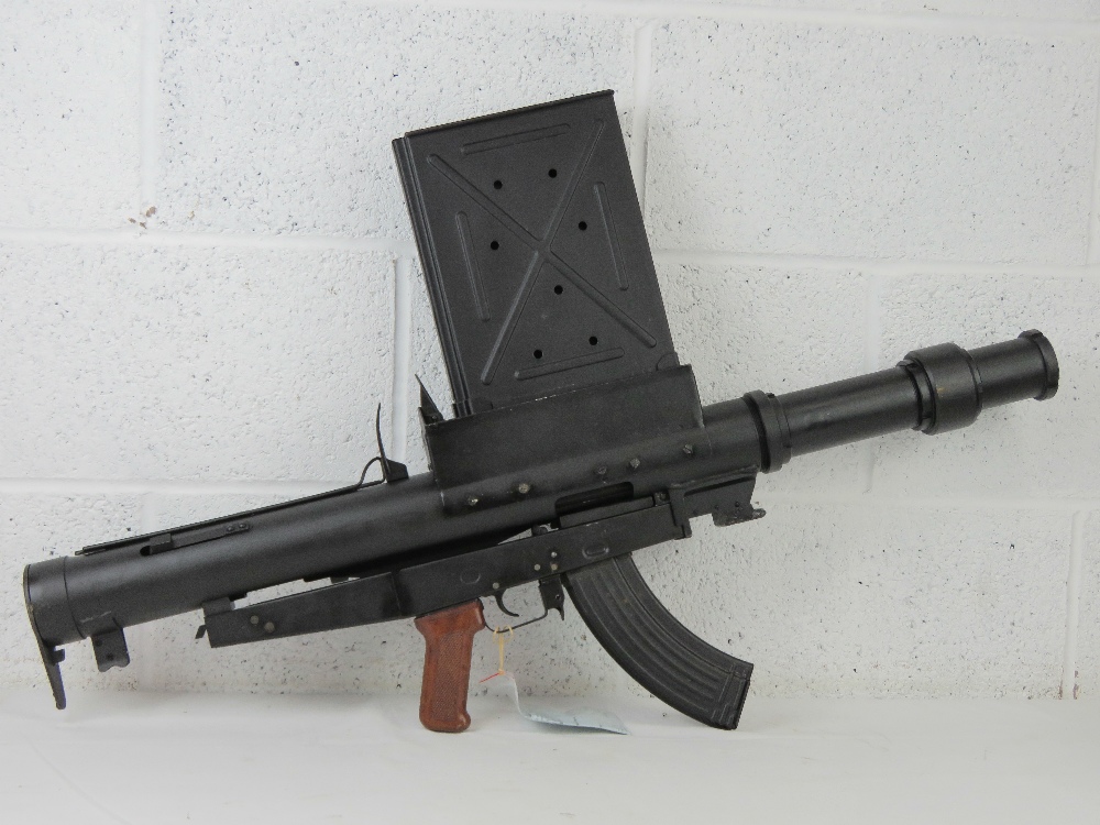 A deactivated AWGL automatic tear gas grenade launcher, sn- 847. With UK certificate.