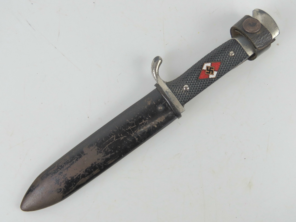 A WWII German Hitler Youth bayonet with scabbard. Blade measuring 14cm.