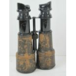 A pair of Army & Navy Paris binoculars, black painted and covered with black leather.